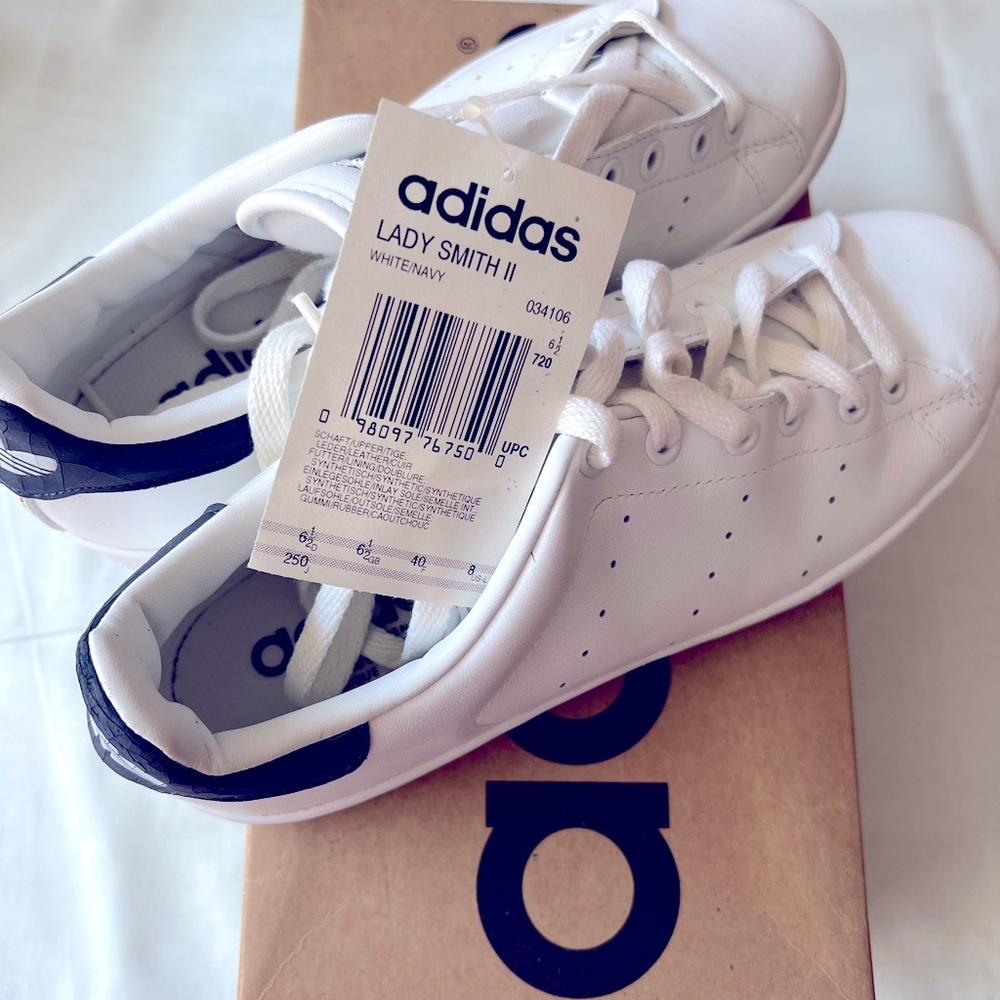 Adidas Lady Smith II tennis shoes in white with navy trim, size 8 US.